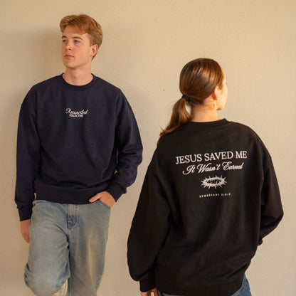 Two people wearing sweatshirts with text, one facing forward and one facing backward.
